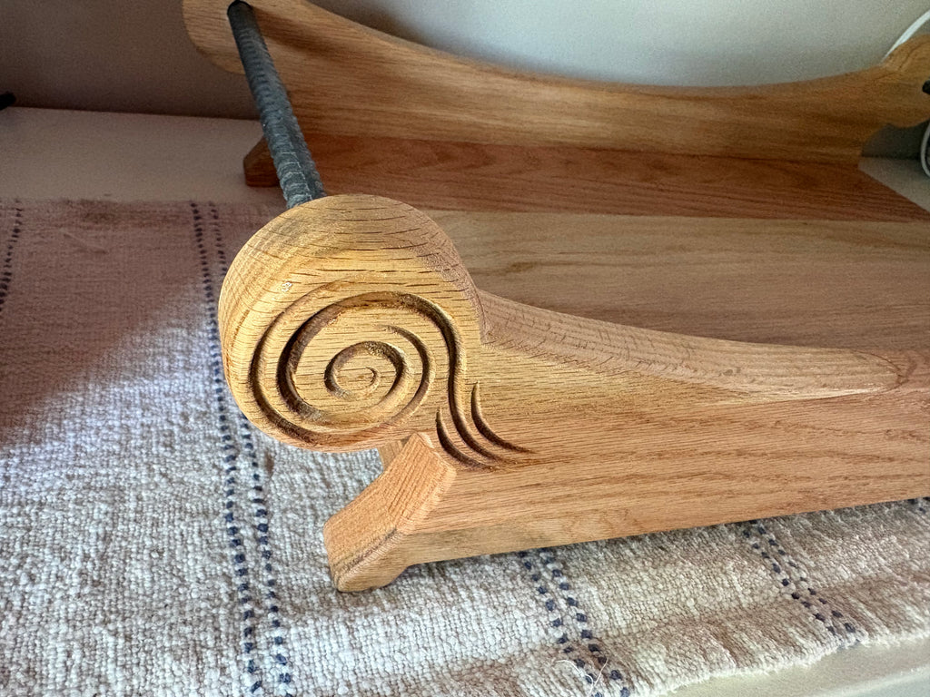 Close-up of The Ember oak tray edge profile and satin finish quality
